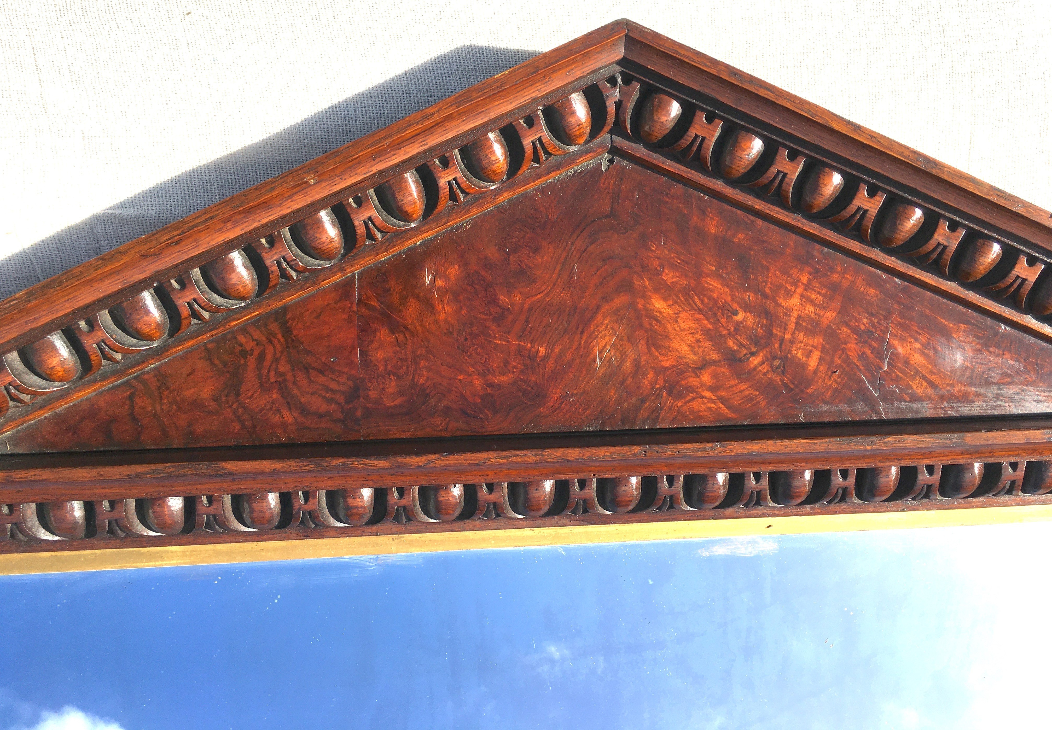 A George IV oak and pollard oak arched overmantel mirror with gilt slip, width 96cm, height 136cm